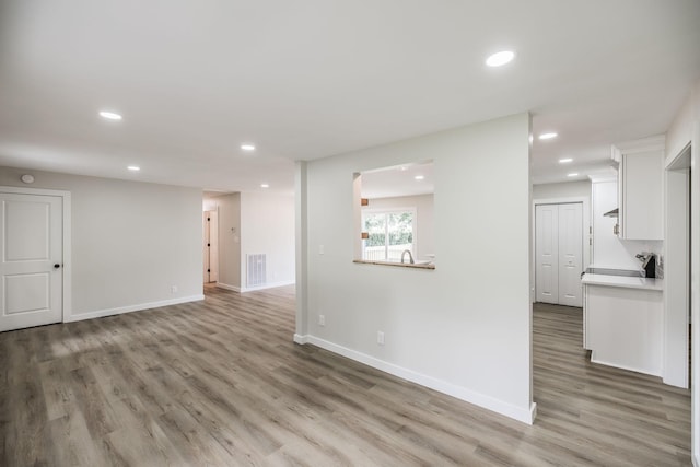 3046 Patton Branch Rd, Goodlettsville, TN 37072 - unfurnished living room with light wood finished floors and recessed lighting