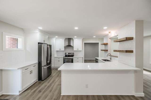 3046 Patton Branch Rd, Goodlettsville, TN 37072 - kitchen featuring stainless steel appliances, wall chimney exhaust hood, open shelves, a peninsula, and decorative backsplash