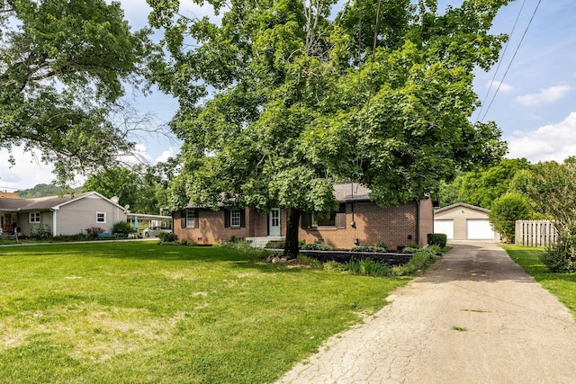 3046 Patton Branch Rd, Goodlettsville, TN 37072 - view of front of property featuring a detached garage, brick siding, and an outbuilding