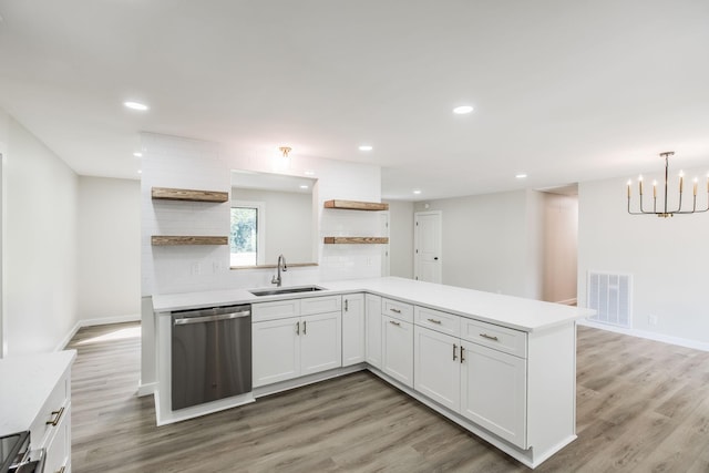 3046 Patton Branch Rd, Goodlettsville, TN 37072 - kitchen with open shelves, stainless steel dishwasher, light countertops, and recessed lighting