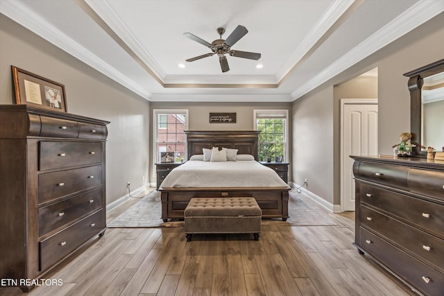 108 Center Park Ln, Oak Ridge, TN 37830 - bedroom featuring a raised ceiling, multiple windows, wood finished floors, ornamental molding, and recessed lighting