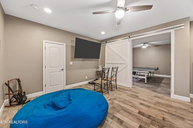 108 Center Park Ln, Oak Ridge, TN 37830 - sitting room featuring a barn door, ceiling fan, wood finished floors, and recessed lighting