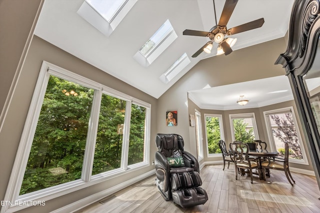 108 Center Park Ln, Oak Ridge, TN 37830 - living area featuring a skylight, plenty of natural light, high vaulted ceiling, light wood-style floors, and ceiling fan