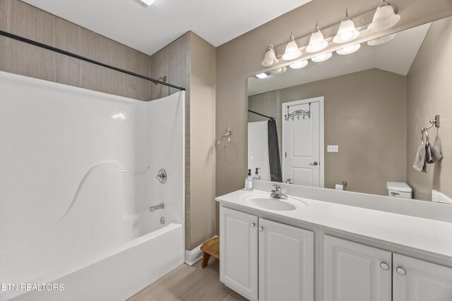 108 Center Park Ln, Oak Ridge, TN 37830 - bathroom featuring vanity, wood finished floors, and tub / shower combination