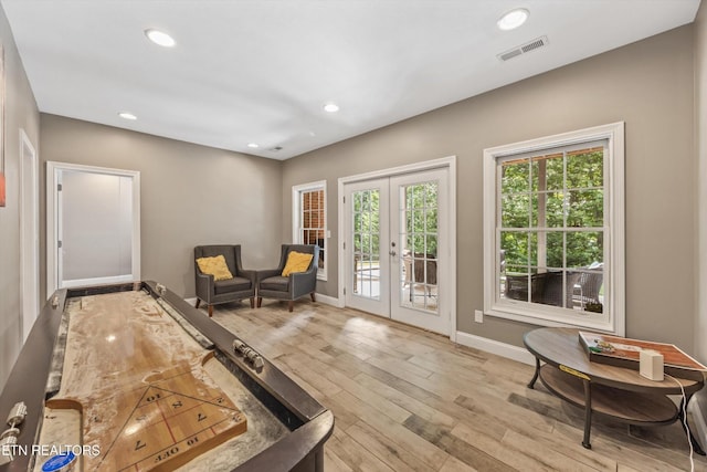 108 Center Park Ln, Oak Ridge, TN 37830 - sitting room with french doors, light wood finished floors, plenty of natural light, and recessed lighting