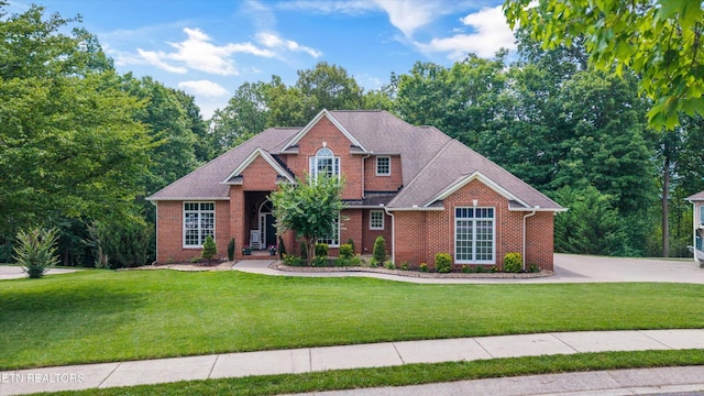 108 Center Park Ln, Oak Ridge, TN 37830 - view of front facade featuring a front lawn and brick siding