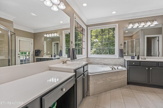 108 Center Park Ln, Oak Ridge, TN 37830 - bathroom with a shower stall, two vanities, a garden tub, recessed lighting, and ornamental molding