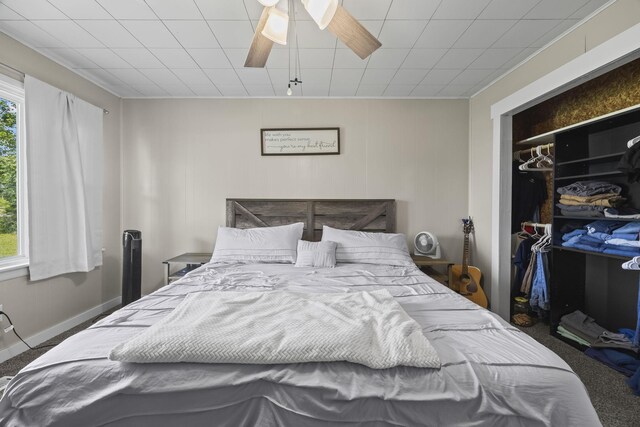 3205 Sylvia Rd, Dickson, TN 37055 - carpeted bedroom featuring multiple windows, a closet, ceiling fan, and a spacious closet