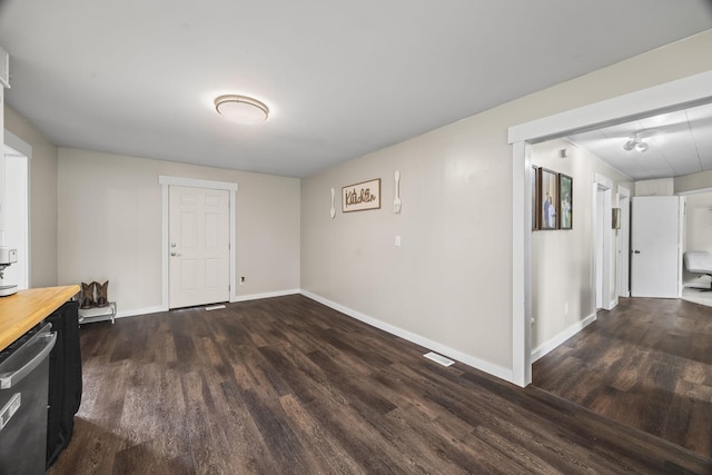 3205 Sylvia Rd, Dickson, TN 37055 - foyer featuring dark wood-style floors and baseboards