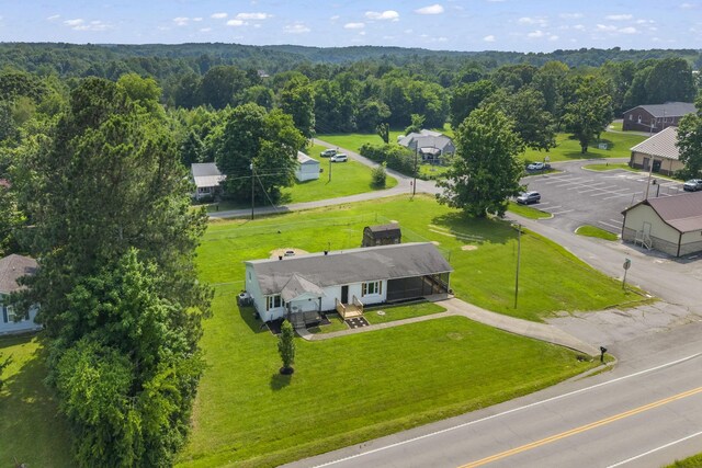 3205 Sylvia Rd, Dickson, TN 37055 - aerial view of property and surrounding area with a heavily wooded area