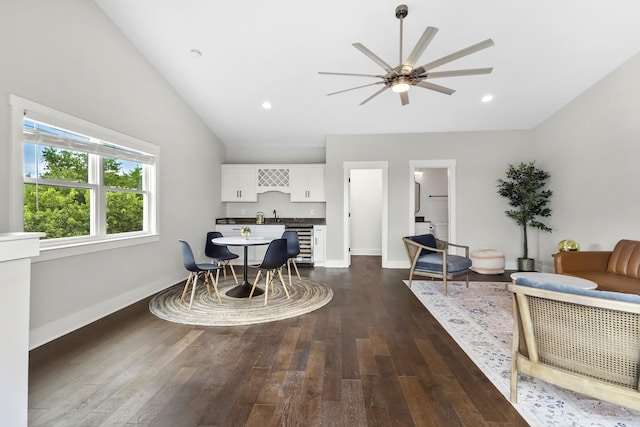 1227 N Avondale Cir, Nashville, TN 37207 - dining room featuring dark wood finished floors, lofted ceiling, wine cooler, ceiling fan, and recessed lighting