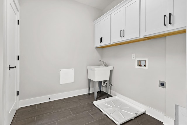 1227 N Avondale Cir, Nashville, TN 37207 - laundry area with cabinet space, electric dryer hookup, and hookup for a washing machine