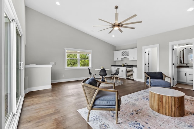1227 N Avondale Cir, Nashville, TN 37207 - living area with wine cooler, ceiling fan, wood finished floors, recessed lighting, and high vaulted ceiling