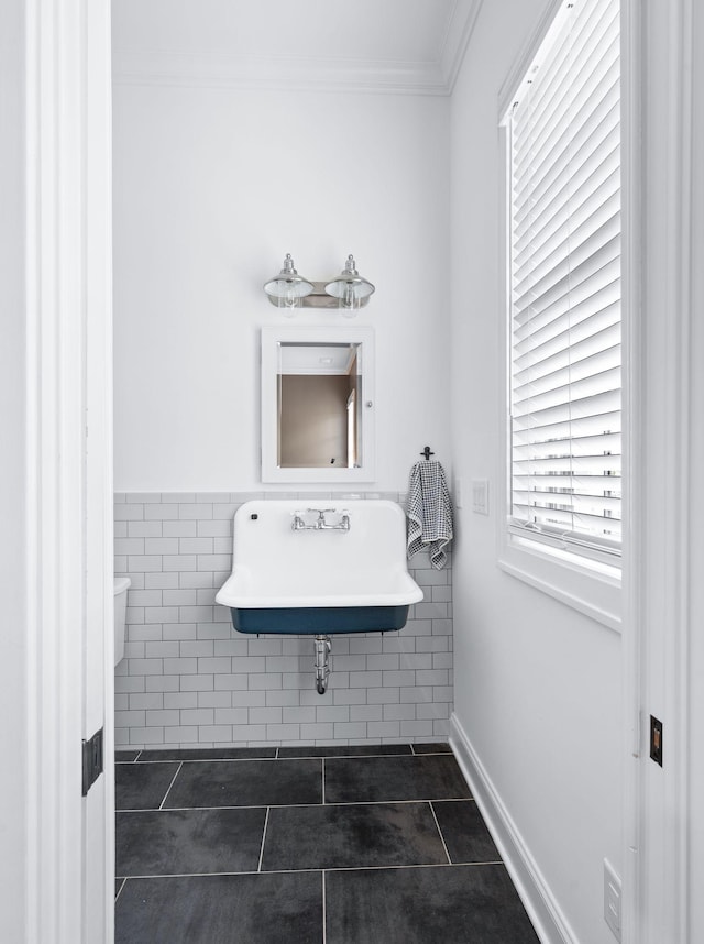 1542 Amesbury Ln, Franklin, TN 37069 - half bath with ornamental molding, tile patterned flooring, tile walls, and a wainscoted wall