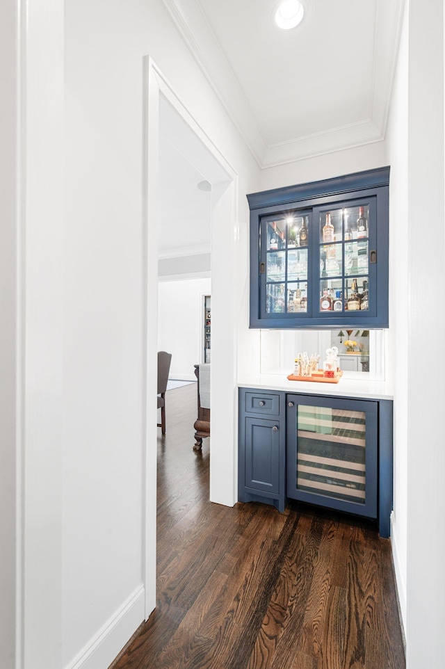 1542 Amesbury Ln, Franklin, TN 37069 - indoor dry bar featuring wine cooler, dark wood finished floors, and crown molding