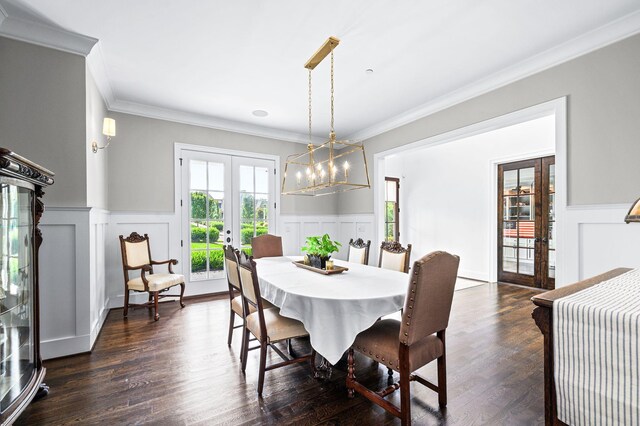 1542 Amesbury Ln, Franklin, TN 37069 - dining space featuring french doors, ornamental molding, a decorative wall, a wainscoted wall, and dark wood-type flooring
