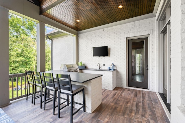 1542 Amesbury Ln, Franklin, TN 37069 - wooden terrace with an outdoor kitchen