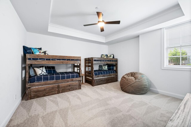 1542 Amesbury Ln, Franklin, TN 37069 - carpeted bedroom with a tray ceiling, crown molding, and a ceiling fan