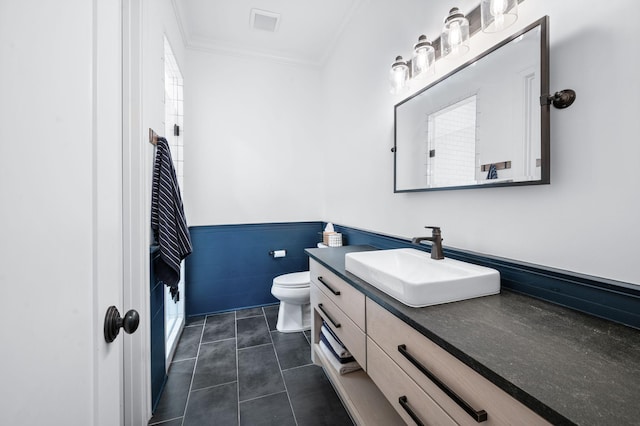 1542 Amesbury Ln, Franklin, TN 37069 - full bathroom with vanity, ornamental molding, tile walls, tile patterned flooring, and wainscoting