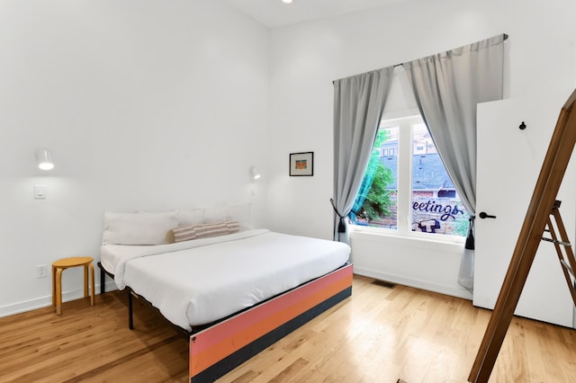 203 N 9th St Unit A/B, Nashville, TN 37206 - bedroom with light wood-type flooring and baseboards