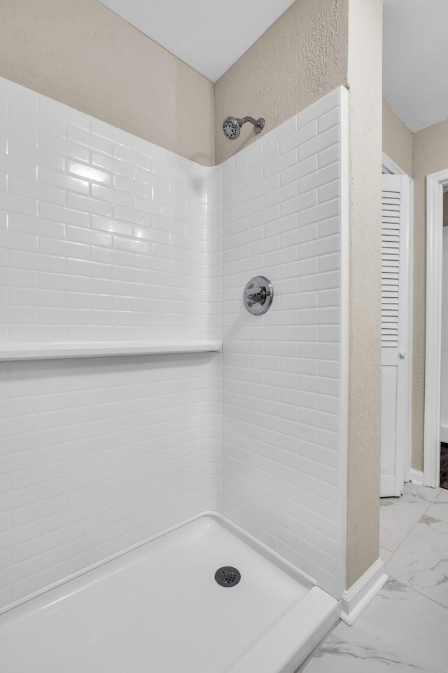 702 Marlboro Ave, Chattanooga, TN 37412 - bathroom with marble finish floors and a tile shower