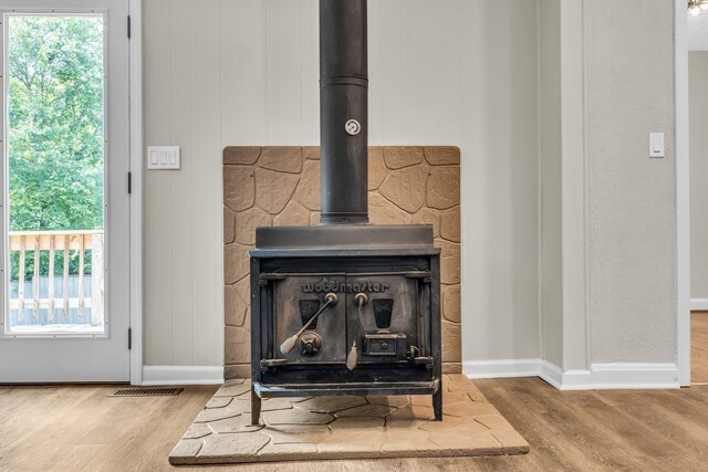 702 Marlboro Ave, Chattanooga, TN 37412 - detailed view of a wood stove and wood finished floors
