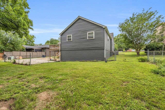 702 Marlboro Ave, Chattanooga, TN 37412 - rear view of property featuring a fenced backyard, a patio area, and a gate