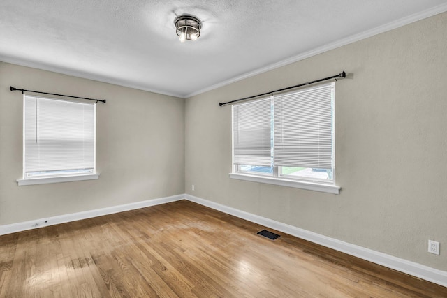 702 Marlboro Ave, Chattanooga, TN 37412 - spare room featuring ornamental molding and wood finished floors