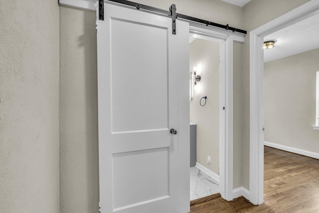 702 Marlboro Ave, Chattanooga, TN 37412 - hallway with baseboards and a barn door