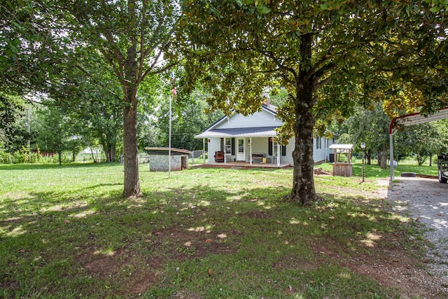 431 Haddon Ln, Winchester, TN 37398 - view of green lawn featuring a porch