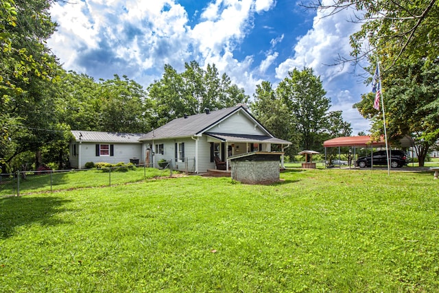 431 Haddon Ln, Winchester, TN 37398 - back of house featuring a carport and a metal roof