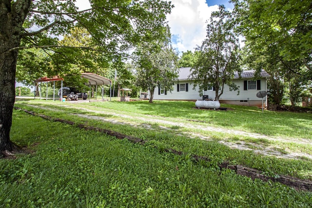 431 Haddon Ln, Winchester, TN 37398 - view of grassy yard featuring a detached carport