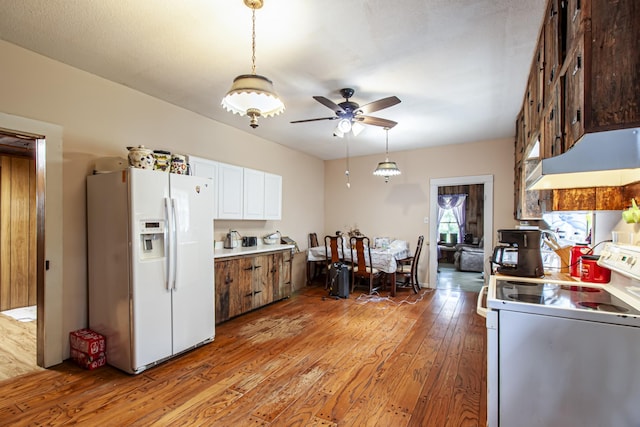 431 Haddon Ln, Winchester, TN 37398 - kitchen featuring white appliances, under cabinet range hood, light wood-style floors, a ceiling fan, and light countertops