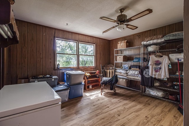 431 Haddon Ln, Winchester, TN 37398 - office space featuring a ceiling fan, light wood-type flooring, wooden walls, and a textured ceiling