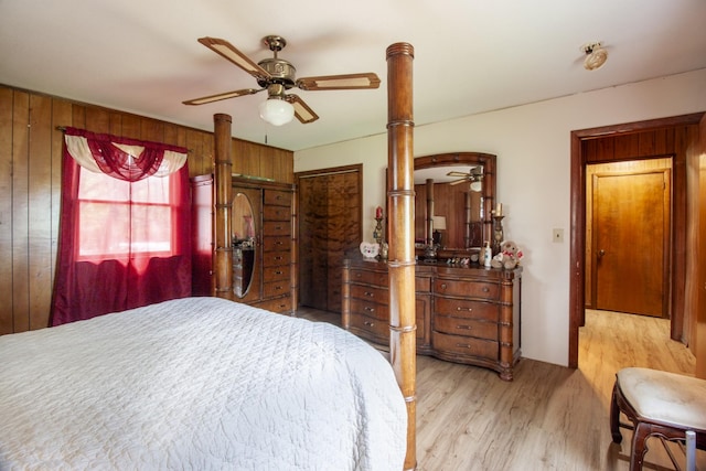 431 Haddon Ln, Winchester, TN 37398 - bedroom featuring light wood-style floors, ceiling fan, and wooden walls