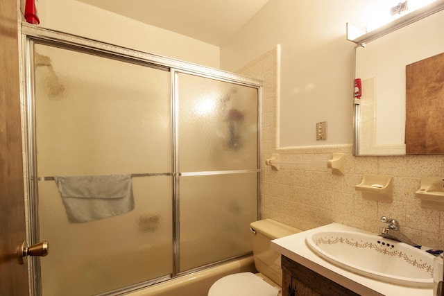 431 Haddon Ln, Winchester, TN 37398 - full bathroom with shower / bath combination with glass door, tile walls, and vanity