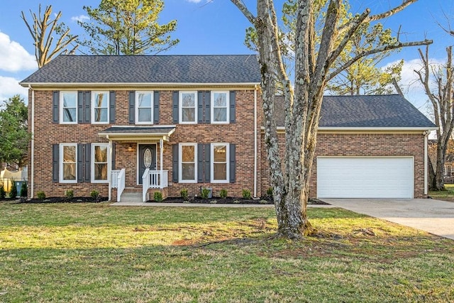 507 Upland Ct, Murfreesboro, TN 37129 - view of front of property featuring an attached garage, concrete driveway, a front yard, and brick siding