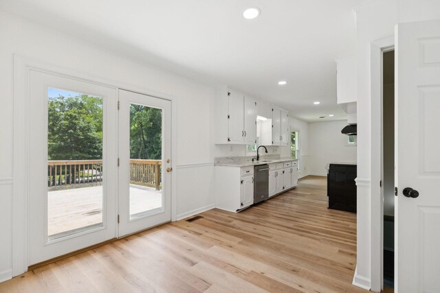 415 Porter Cir, Columbia, TN 38401 - kitchen featuring dishwasher, white cabinetry, light wood-style flooring, and recessed lighting