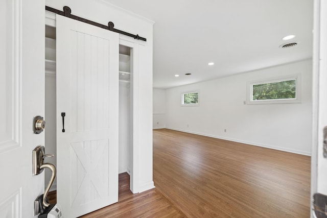 415 Porter Cir, Columbia, TN 38401 - foyer featuring a barn door, wood finished floors, and recessed lighting
