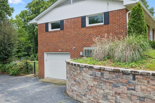 415 Porter Cir, Columbia, TN 38401 - view of home's exterior with an attached garage, driveway, and brick siding