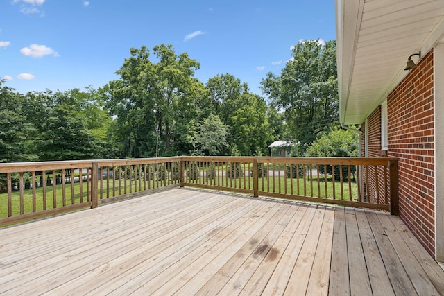 415 Porter Cir, Columbia, TN 38401 - deck featuring a lawn and view of wooded area