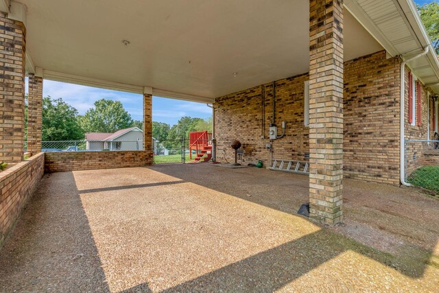 303 Furnace Hollow Rd, Dickson, TN 37055 - view of patio featuring a carport