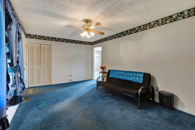 303 Furnace Hollow Rd, Dickson, TN 37055 - unfurnished room featuring carpet floors, a textured ceiling, and ceiling fan