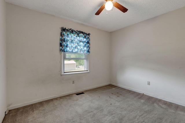 303 Furnace Hollow Rd, Dickson, TN 37055 - unfurnished room featuring carpet floors, a ceiling fan, and a textured ceiling