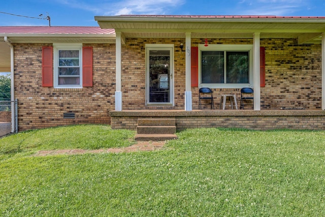 303 Furnace Hollow Rd, Dickson, TN 37055 - entrance to property featuring a porch, brick siding, and a metal roof