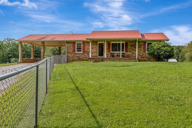 303 Furnace Hollow Rd, Dickson, TN 37055 - view of front of home featuring a porch, a metal roof, and brick siding