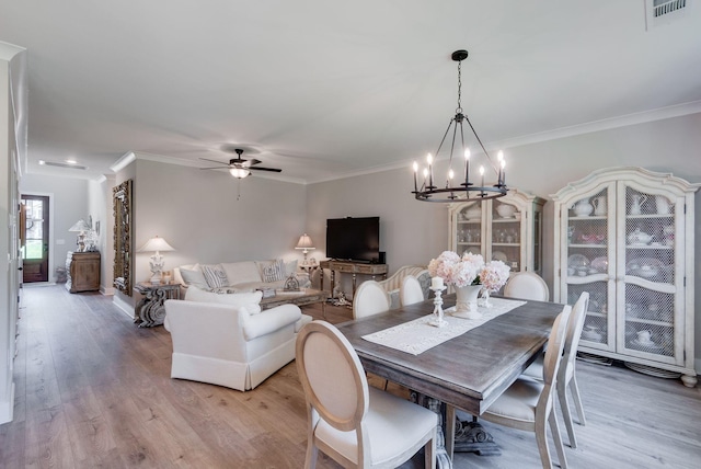 588 Davis Valley Dr, Columbia, TN 38401 - dining space with a chandelier, ceiling fan, light wood-style flooring, and ornamental molding