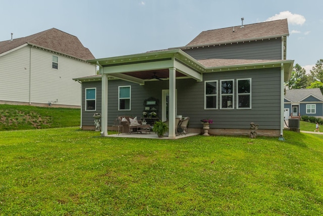 588 Davis Valley Dr, Columbia, TN 38401 - back of property with a ceiling fan, a patio, and a yard