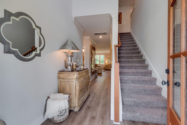 588 Davis Valley Dr, Columbia, TN 38401 - staircase with crown molding and wood finished floors