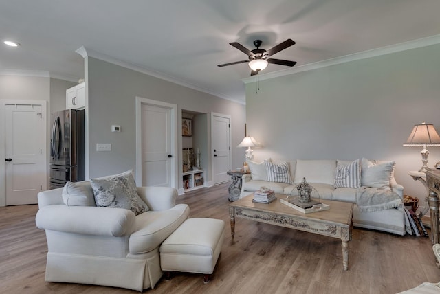 588 Davis Valley Dr, Columbia, TN 38401 - living area featuring crown molding, ceiling fan, and wood finished floors